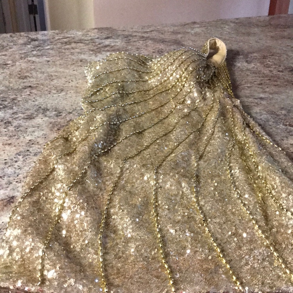 Beautiful gold sequined dress.